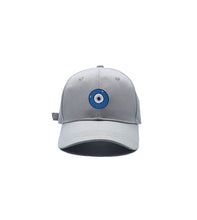 Load image into Gallery viewer, Blue Evil Eye embroidered on a grey cotton dad hat / cap. Featured on white background image.