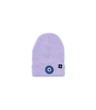 Load image into Gallery viewer, Blue Evil Eye embroidered on a lavender acrylic beanie, with an RA Attire woven logo label. Featured on white background image.