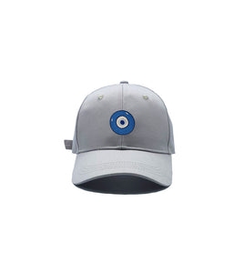 Blue Evil Eye embroidered on a grey cotton dad hat / cap. Featured on white background image.