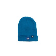 Load image into Gallery viewer, Blue Evil Eye embroidered on a teal acrylic beanie, with an RA Attire woven logo label. Featured on white background image.