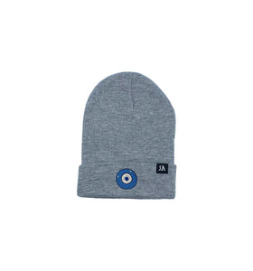 Blue Evil Eye embroidered on a grey acrylic beanie, with an RA Attire woven logo label. Featured on white background image.